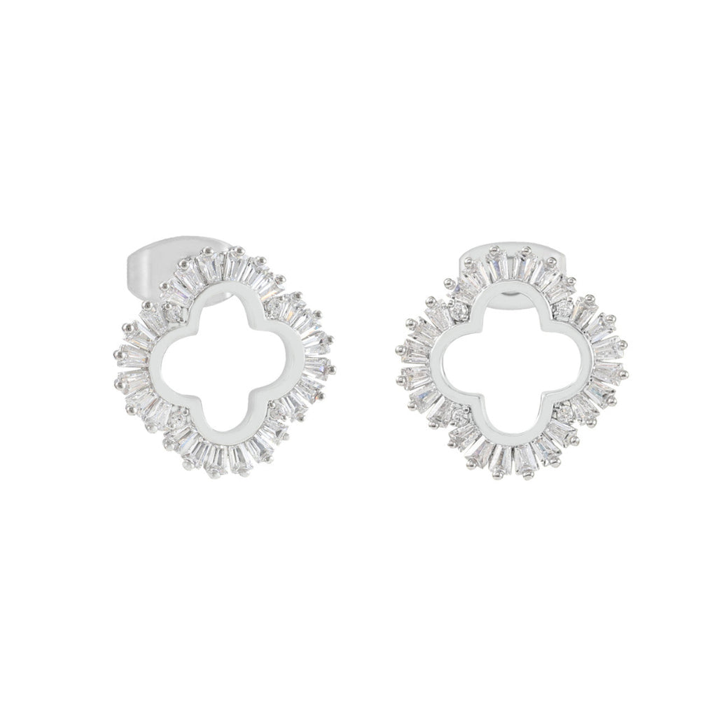 Pair of silver earrings with clear gemstones on a white background